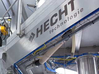 Hecht logo op de apparatuur van de klant